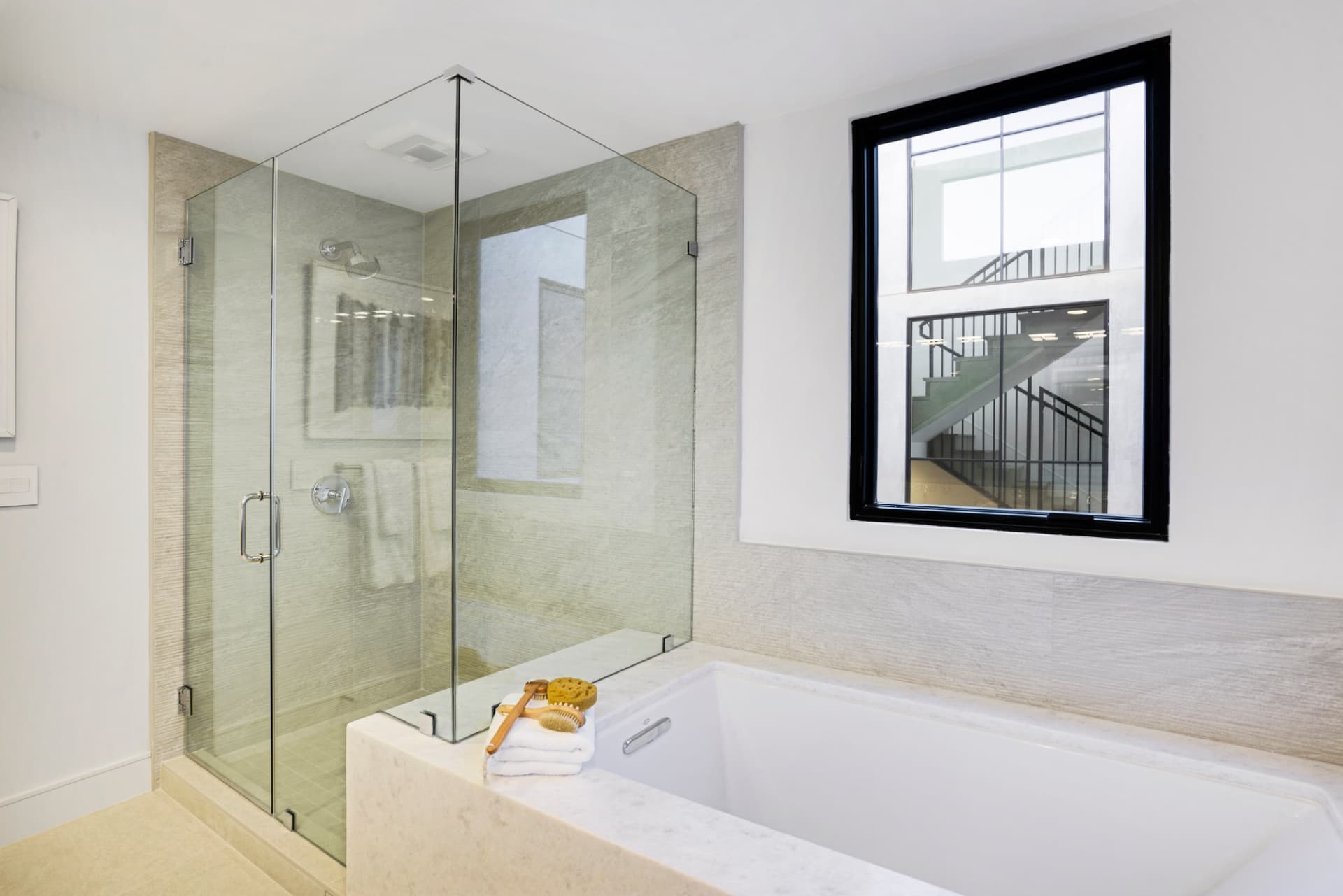 Los Angeles bathroom with soaking tub and glass shower