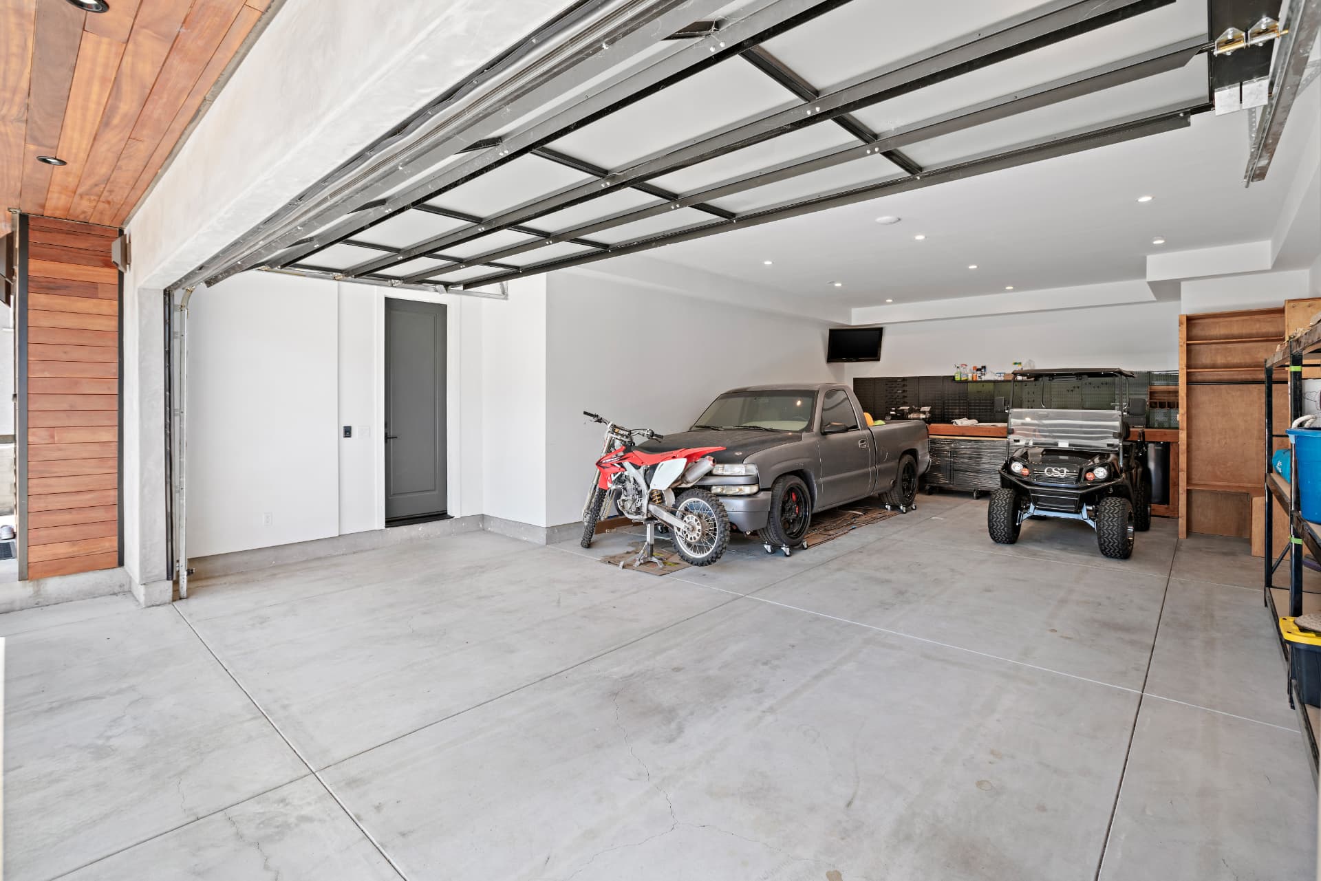 Woodland Hills garage workshop with concrete floors and workbench
